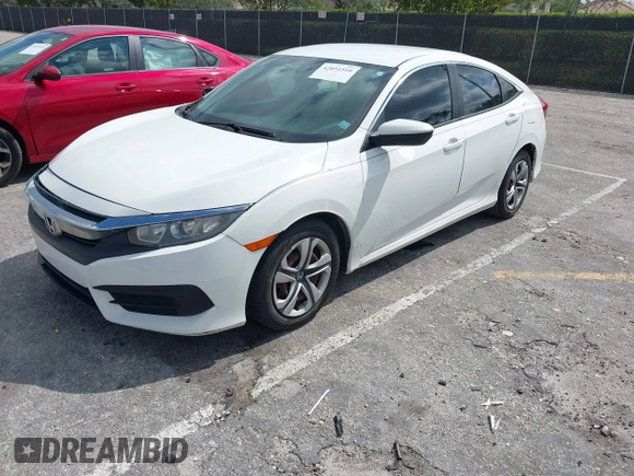 2016 Honda Civic Sedan LX with VIN 19XFC2F59GE068847, listed as a IAAI auction lot 42051510 with 113,450 mi miles. Bid and sale history available at carsss.com. Image 2.