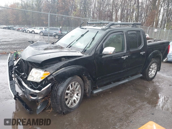 2011 Nissan Frontier Pro-4X with VIN 1N6AD0EV5BC440663, listed as a IAAI auction lot 41923918 with 168,331 mi miles and . Bid and sale history available at DreamBid. Image 17.