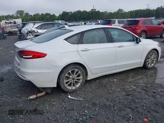 2020 Ford Fusion SE z VIN 3FA6P0HD8LR160330, wystawiony jako IAAI lot #42348552 z przebiegiem 95 610 mil mil oraz . Historia ofert i sprzedaży dostępna na DreamBid. Obrazek 4.