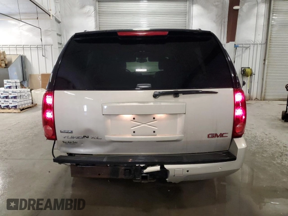 2007 GMC Yukon XL SLT with VIN 1GKFK16307J310654, listed as a Copart auction lot 47394195 with 197,988 mi miles and Salvage Title. Bid and sale history available at carsss.com. Image 6.