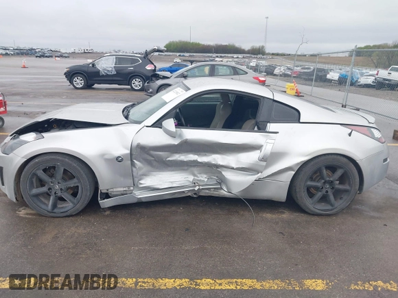 2003 Nissan 350Z Touring z VIN JN1AZ34E43T014247, wystawiony jako IAAI lot #42120812 z przebiegiem 112 263 mil mil oraz . Historia ofert i sprzedaży dostępna na DreamBid. Obrazek 14.