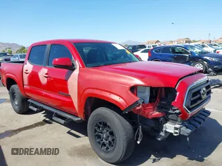 2021 Toyota Tacoma SR5 with VIN 5TFAZ5CN0MX113975, listed as a IAAI auction lot 42451720 with 21,064 mi miles and . Bid and sale history available at DreamBid. Image 1.