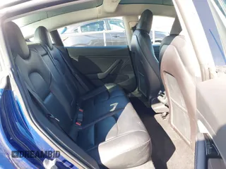 2019 Tesla Model 3 Mid Range with VIN 5YJ3E1EA8KF436086, listed as a IAAI auction lot 41682093 with 70,332 mi miles and . Bid and sale history available at DreamBid. Image 8.