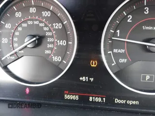 2016 BMW 3 Series 328i with VIN WBA8E9G56GNT82443, listed as a IAAI auction lot 41812424 with 56,965 mi miles. Bid and sale history available at carsss.com. Image 7.