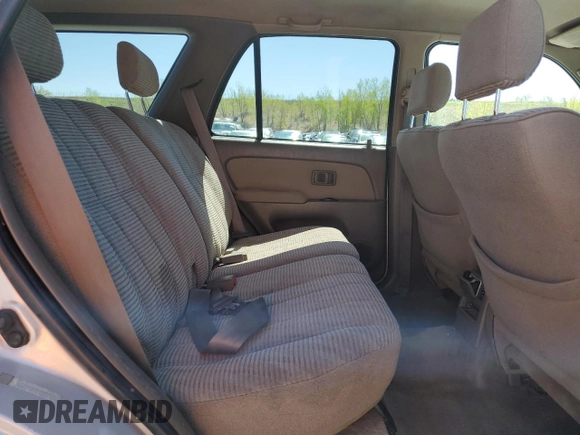 1997 Toyota 4Runner SR5 z VIN JT3HN86RXV0057844, wystawiony jako Copart lot #55357775 z przebiegiem 308 521 mil mil oraz Szkoda całkowita • Salvage title. Historia ofert i sprzedaży dostępna na DreamBid. Obrazek 11.