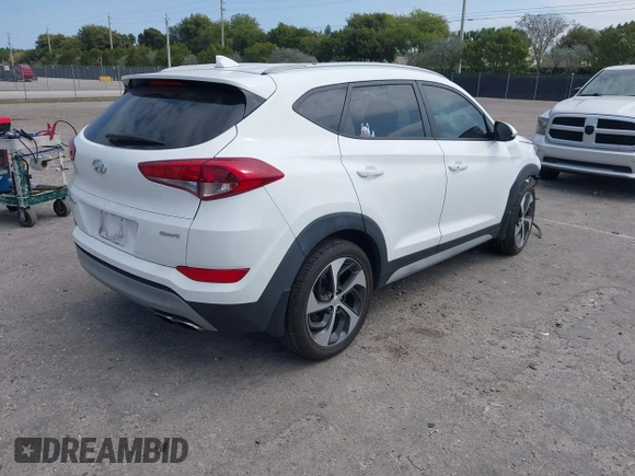 2018 Hyundai Tucson Sport with VIN KM8J33AL5JU691991, listed as a IAAI auction lot 41817480 with 89,129 mi miles. Bid and sale history available at carsss.com. Image 4.