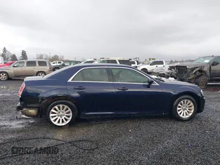 2012 Chrysler 300 with VIN 2C3CCAAG7CH142422, listed as a IAAI auction lot 41555202 with 134,864 mi miles and . Bid and sale history available at DreamBid. Image 13.