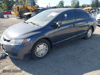 2009 Honda Civic Hybrid with VIN JHMFA36209S008939, listed as a IAAI auction lot 41798952 with 163,650 mi miles. Bid and sale history available at carsss.com. Image 2.