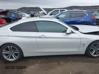 2016 BMW 4 Series 428i with VIN WBA3N7C54GK227475, listed as a IAAI auction lot 40963425 with 87,408 mi miles and . Bid and sale history available at carsss.com. Image 13.