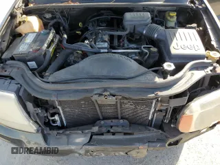 2004 Jeep Grand Cherokee Limited with VIN 1J4GW58S24C374012, listed as a Copart auction lot 44896325 with 153,978 mi miles and Salvage title. Bid and sale history available at DreamBid. Image 12.