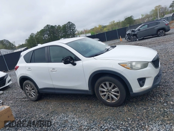 2015 Mazda CX-5 Touring with VIN JM3KE2CY4F0436664, listed as a IAAI auction lot 41876238 with 374,305 mi miles. Bid and sale history available at carsss.com. Image 13.