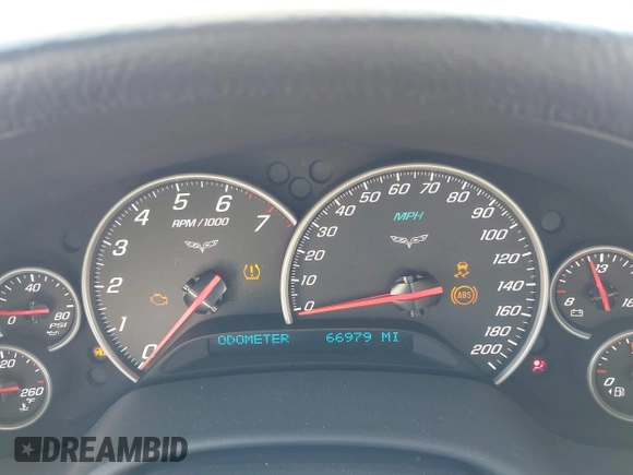 2012 Chevrolet Corvette 1LT with VIN 1G1YE2DW5C5102943, listed as a IAAI auction lot 42629221 with 66,979 mi miles and . Bid and sale history available at DreamBid. Image 7.