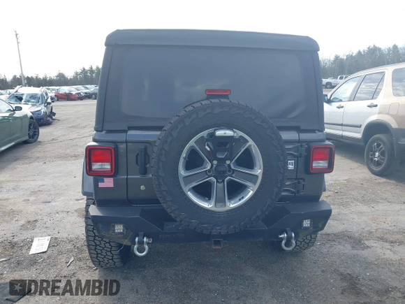 2018 Jeep Wrangler Unlimited Sahara with VIN 1C4HJXEG0JW246110, listed as a IAAI auction lot 41826662 with 65,236 mi miles. Bid and sale history available at carsss.com. Image 16.