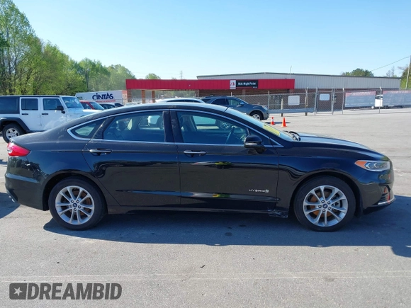 2019 Ford Fusion SEL with VIN 3FA6P0MU6KR252797, listed as a IAAI auction lot 41994504 with 106,029 mi miles and . Bid and sale history available at DreamBid. Image 13.