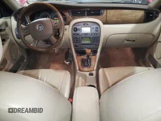 2004 Jaguar X-Type with VIN SAJEA51CX4WE15195, listed as a Copart auction lot 57868405 with 171,698 mi miles and Non Repairable. Bid and sale history available at DreamBid. Image 8.