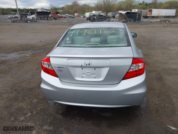 2012 Honda Civic Sdn LX with VIN 19XFB2F50CE353837, listed as a IAAI auction lot 41961162 with 140,583 mi miles. Bid and sale history available at carsss.com. Image 17.