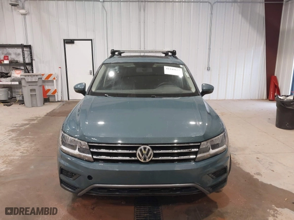 2021 Volkswagen Tiguan SE with VIN 3VV2B7AX6MM077337, listed as a IAAI auction lot 41345637 with 62,989 mi miles. Bid and sale history available at carsss.com. Image 13.