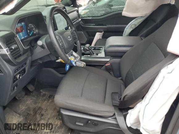 2023 Ford F-150 XL with VIN 1FTEW1EP4PKE78341, listed as a Copart auction lot 59658045 with 27,936 mi miles and Clean title. Bid and sale history available at DreamBid. Image 7.