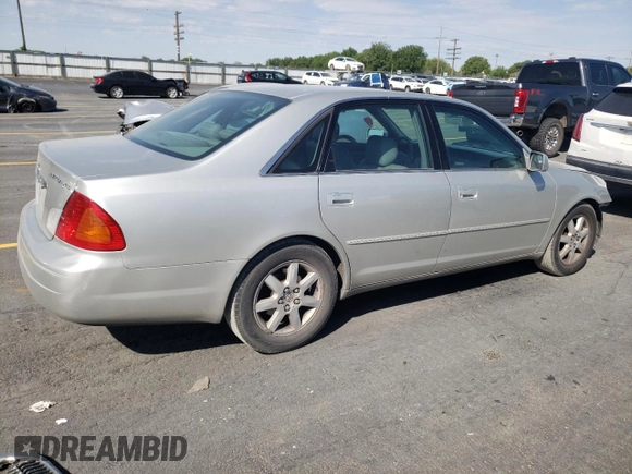 2000 Toyota Avalon XL with VIN 4T1BF28B7YU112576, listed as a Copart auction lot 59726505 with 242,412 mi miles and Salvage title. Bid and sale history available at DreamBid. Image 3.