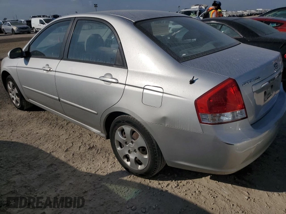 2009 Kia Spectra EX with VIN KNAFE221X95631249, listed as a Copart auction lot 75119304 with 193,338 mi miles and Salvage Title. Bid and sale history available at carsss.com. Image 2.