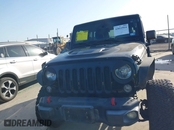2015 Jeep Wrangler Unlimited Rubicon Hard Rock with VIN 1C4HJWFG7FL602344, listed as a IAAI auction lot 42011914 with 109,238 mi miles and . Bid and sale history available at DreamBid. Image 12.