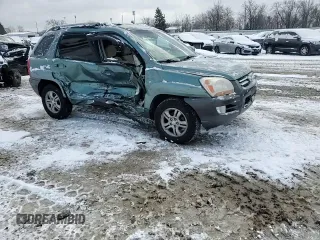 2005 Kia Sportage LX with VIN KNDJF723X57125430, listed as a Copart auction lot 86552714 with Not Provided miles and Salvage Title. Bid and sale history available at carsss.com. Image 11.