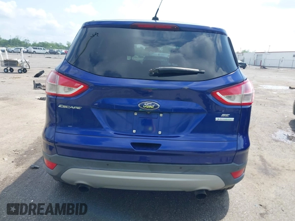 2014 Ford Escape SE with VIN 1FMCU0GX8EUC53549, listed as a IAAI auction lot 42067617 with 234,025 mi miles and . Bid and sale history available at DreamBid. Image 16.