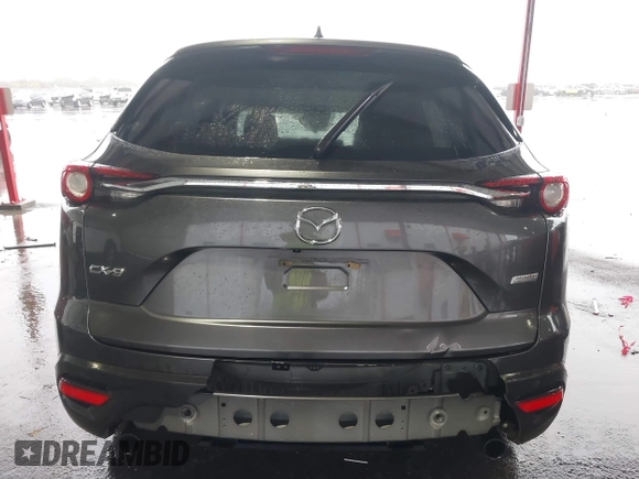 2018 Mazda CX-9 Sport z VIN JM3TCABY6J0212634, wystawiony jako IAAI lot #41187204 z przebiegiem 44 529 mil mil oraz . Historia ofert i sprzedaży dostępna na DreamBid. Obrazek 16.