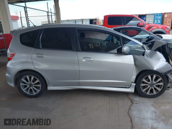 2013 Honda Fit Sport with VIN JHMGE8H54DC047839, listed as a IAAI auction lot 42083683 with 201,284 mi miles. Bid and sale history available at carsss.com. Image 13.