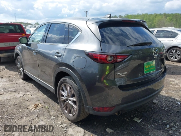 2019 Mazda CX-5 Grand Touring with VIN JM3KFBDM7K0619379, listed as a IAAI auction lot 42007107 with 209,590 mi miles. Bid and sale history available at carsss.com. Image 3.