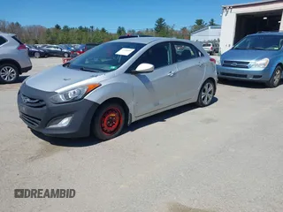 2013 Hyundai Elantra GT with VIN KMHD35LE7DU086883, listed as a IAAI auction lot 42158289 with 117,290 mi miles. Bid and sale history available at carsss.com. Image 2.