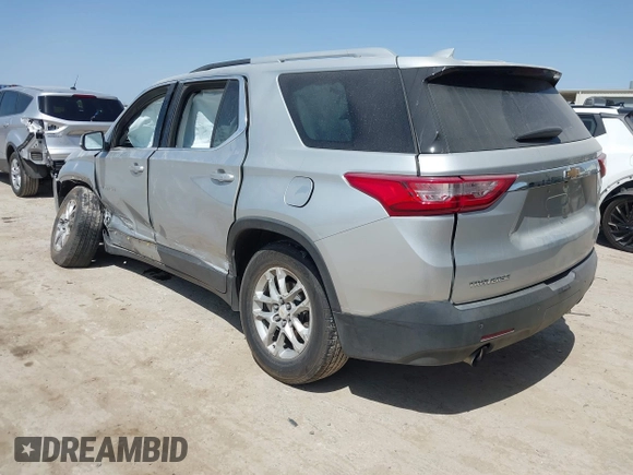 2018 Chevrolet Traverse LT Cloth z VIN 1GNERGKW3JJ173973, wystawiony jako IAAI lot #41860647 z przebiegiem 143 854 mil mil oraz . Historia ofert i sprzedaży dostępna na DreamBid. Obrazek 3.