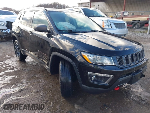 2019 Jeep Compass Trailhawk with VIN 3C4NJDDBXKT671364, listed as a IAAI auction lot 41655974 with 104,252 mi miles and . Bid and sale history available at carsss.com. Image 1.
