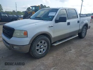 2004 Ford F-150 XLT with VIN 1FTPW12594KD64519, listed as a IAAI auction lot 42414613 with 325,406 mi miles and . Bid and sale history available at DreamBid. Image 2.