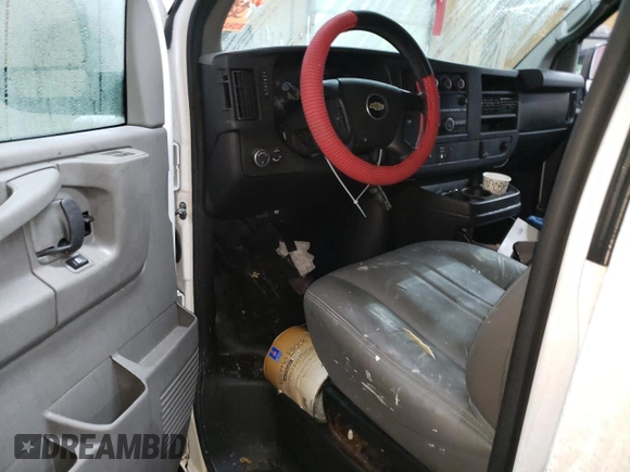 2015 Chevrolet Express Cargo with VIN 1GCWGFCF8F1197303, listed as a Copart auction lot 84651484 with Not provided miles and Salvage title. Bid and sale history available at DreamBid. Image 8.