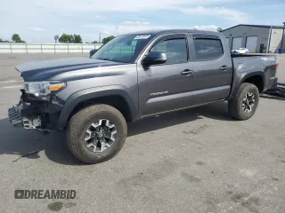 2021 Toyota Tacoma SR z VIN 5TFCZ5AN2MX255160, wystawiony jako Copart lot #55479535 z przebiegiem 61 021 mil mil oraz Szkoda całkowita • Salvage title. Historia ofert i sprzedaży dostępna na DreamBid. Obrazek 1.