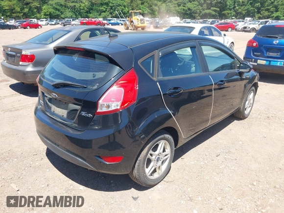 2019 Ford Fiesta SE z VIN 3FADP4EJ0KM125724, wystawiony jako IAAI lot #42320657 z przebiegiem 53 728 mil mil oraz . Historia ofert i sprzedaży dostępna na DreamBid. Obrazek 4.