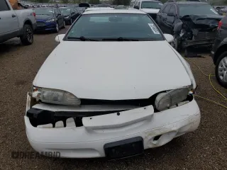 1994 Ford Thunderbird LX with VIN 1FALP62W5RH211700, listed as a Copart auction lot 72046634 with 61,570 mi miles and Salvage Title. Bid and sale history available at DreamBid. Image 5.