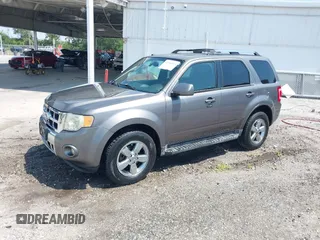 2010 Ford Escape Limited z VIN 1FMCU9EG5AKC61203, wystawiony jako IAAI lot #42334919 z przebiegiem 184 243 mil mil oraz . Historia ofert i sprzedaży dostępna na DreamBid. Obrazek 2.