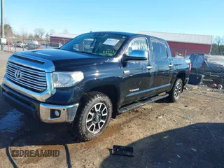 2016 Toyota Tundra 4WD Truck LTD with VIN 5TFHY5F15GX513903, listed as a IAAI auction lot 41844578 with 157,742 mi miles. Bid and sale history available at carsss.com. Image 2.