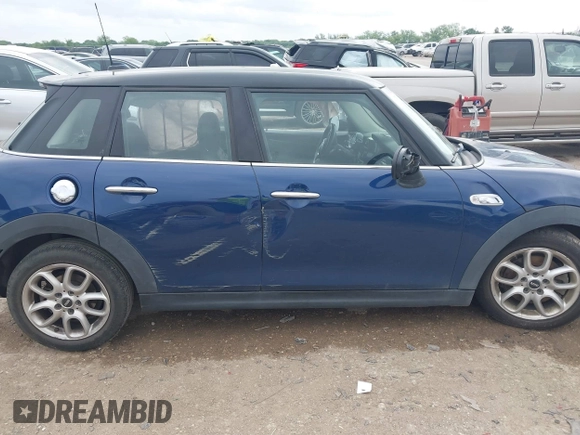2017 MINI Hardtop 4 Door Cooper S z VIN WMWXU3C3XH2F49313, wystawiony jako IAAI lot #42137594 z przebiegiem 87 865 mil mil oraz . Historia ofert i sprzedaży dostępna na DreamBid. Obrazek 6.