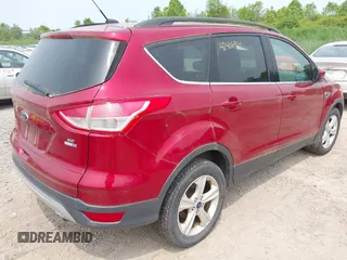 2016 Ford Escape SE z VIN 1FMCU9GX6GUB29495, wystawiony jako IAAI lot #42406964 z przebiegiem 103 892 mil mil oraz . Historia ofert i sprzedaży dostępna na DreamBid. Obrazek 4.