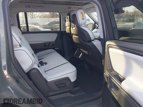 2024 Rivian R1S Launch Edition with VIN 7PDSGABL1RN035074, listed as a IAAI auction lot 41276556 with Not Provided miles. Bid and sale history available at carsss.com. Image 8.