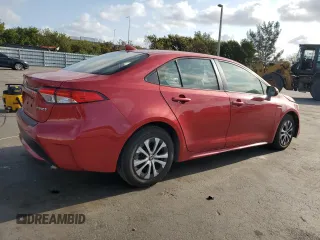 2021 Toyota Corolla Hybrid LE with VIN JTDEAMDE5MJ012662, listed as a Copart auction lot 52142455 with 138,564 mi miles and Clean Title. Bid and sale history available at carsss.com. Image 3.