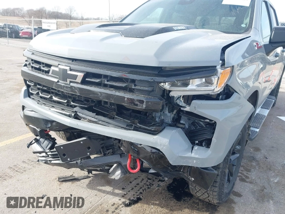 2024 Chevrolet Silverado 1500 LT Trail Boss with VIN 3GCUDFE83RG314063, listed as a IAAI auction lot 41824385 with 14,164 mi miles and . Bid and sale history available at DreamBid. Image 6.