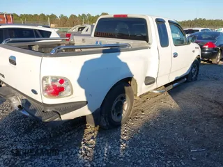 1998 Ford F-150 XL with VIN 1FTZX0724WKA18430, listed as a IAAI auction lot 41220499 with 129,780 mi miles and . Bid and sale history available at DreamBid. Image 4.