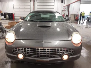 2003 Ford Thunderbird Deluxe with VIN 1FAHP60A53Y113819, listed as a IAAI auction lot 41724732 with Not Provided miles and . Bid and sale history available at DreamBid. Image 6.