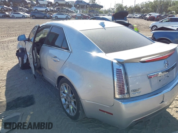 2011 Cadillac CTS Performance with VIN 1G6DJ5ED6B0128062, listed as a IAAI auction lot 42150038 with 245,293 mi miles and . Bid and sale history available at DreamBid. Image 3.