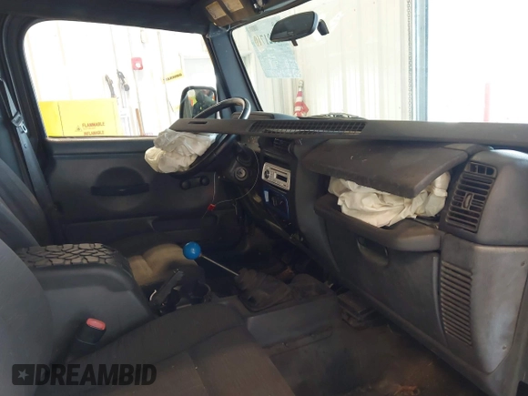 2003 Jeep Wrangler Sport with VIN 1J4FA49S53P311822, listed as a IAAI auction lot 41621710 with 156,023 mi miles. Bid and sale history available at carsss.com. Image 5.