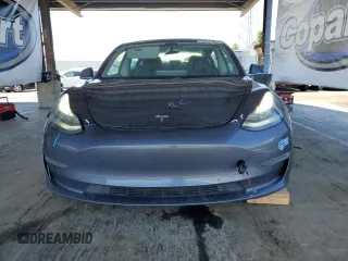 2020 Tesla Model 3 Standard Range Plus z VIN 5YJ3E1EA3LF803624, wystawiony jako Copart lot #56145255 z przebiegiem 149 398 mil mil oraz Szkoda całkowita • Salvage title. Historia ofert i sprzedaży dostępna na DreamBid. Obrazek 5.